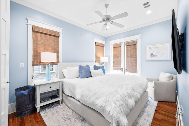 44 Thicket Cir, Santa Rosa Beach, FL 32459 - bedroom with wood finished floors, ceiling fan, and recessed lighting