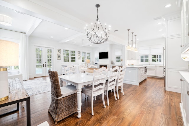 44 Thicket Cir, Santa Rosa Beach, FL 32459 - dining space featuring a chandelier, light wood-style flooring, recessed lighting, and beamed ceiling