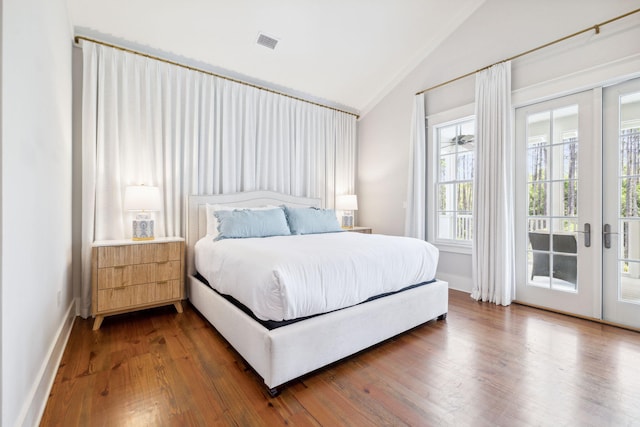 44 Thicket Cir, Santa Rosa Beach, FL 32459 - bedroom with lofted ceiling, access to exterior, dark wood-type flooring, french doors, and baseboards
