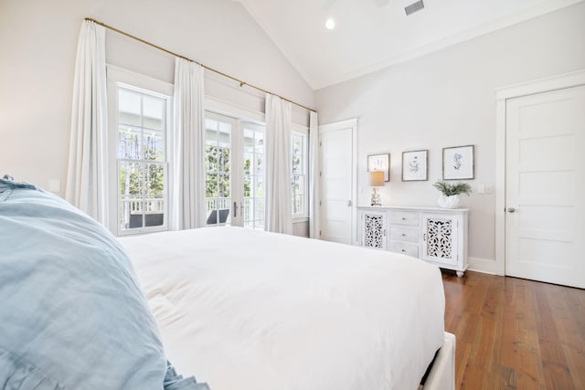 44 Thicket Cir, Santa Rosa Beach, FL 32459 - bedroom with wood finished floors, access to exterior, and high vaulted ceiling