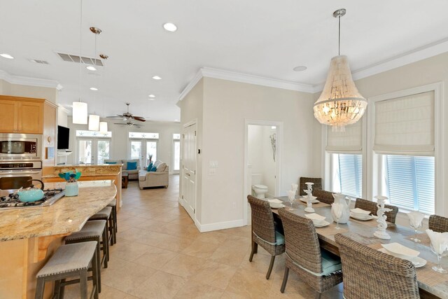 dining space featuring recessed lighting, visible vents, crown molding, and baseboards