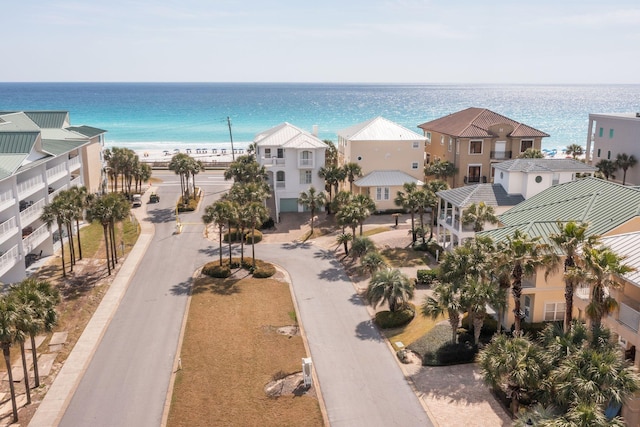 aerial view featuring a water view and a residential view