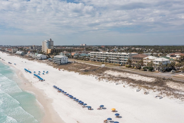 aerial view featuring a view of city, a water view, and a view of the beach