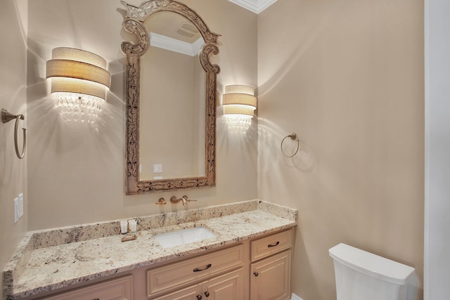 half bathroom featuring toilet and vanity