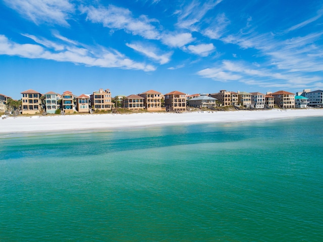 water view with a view of the beach and a residential view