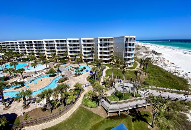 bird's eye view featuring a water view and a view of the beach