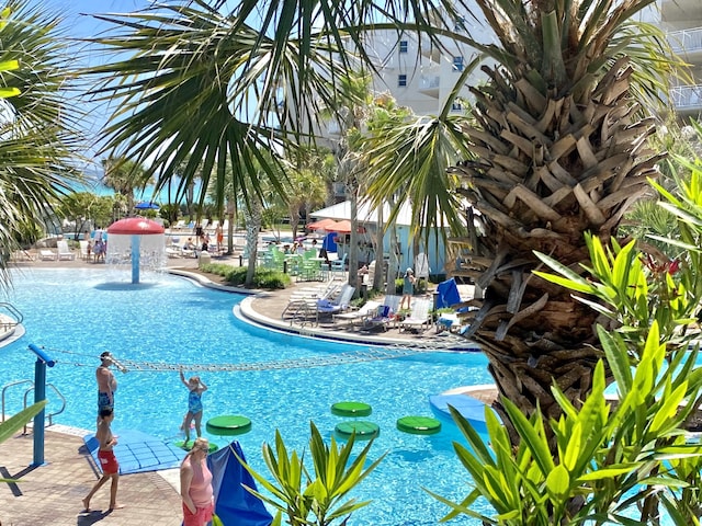 pool featuring a patio area