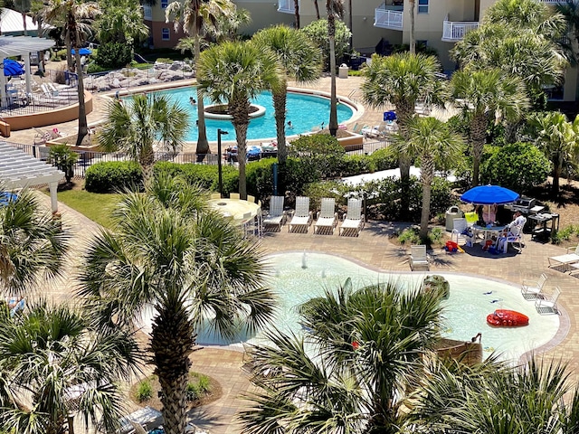 view of pool featuring a patio