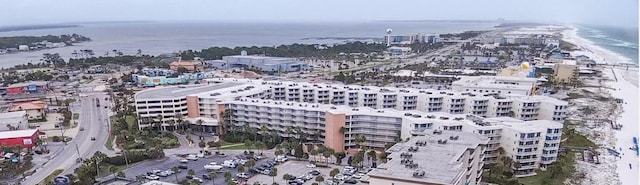 bird's eye view featuring a water view and a city view