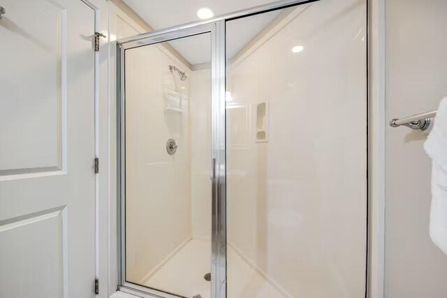 full bathroom with a stall shower