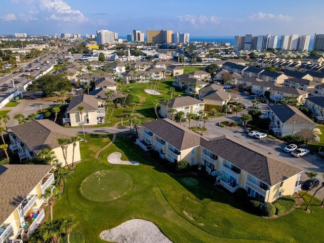 bird's eye view featuring a view of city and golf course view