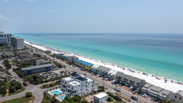 aerial view featuring a water view and a beach view