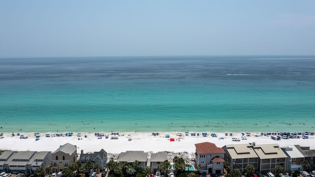 view of water feature featuring a residential view and a view of the beach