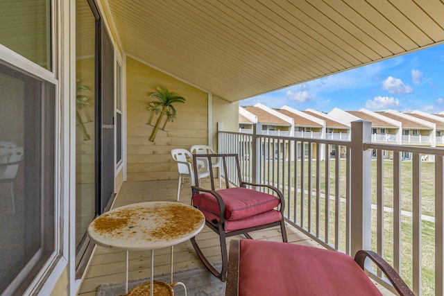 balcony featuring a residential view