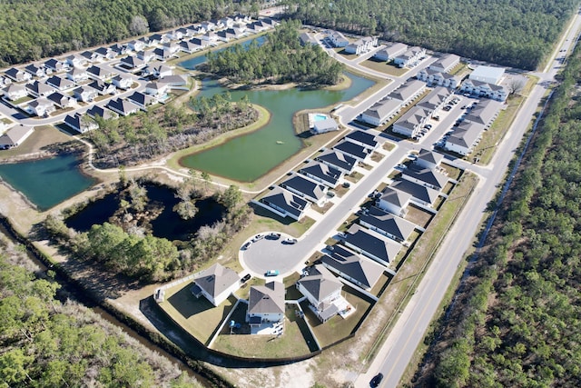 aerial view featuring a water view and a residential view