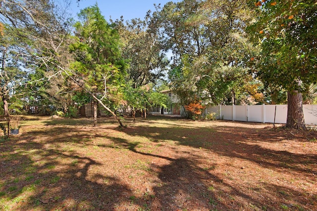 view of yard featuring fence