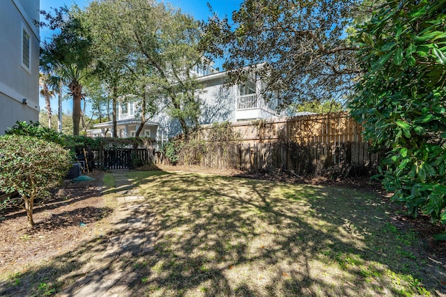 view of yard featuring fence