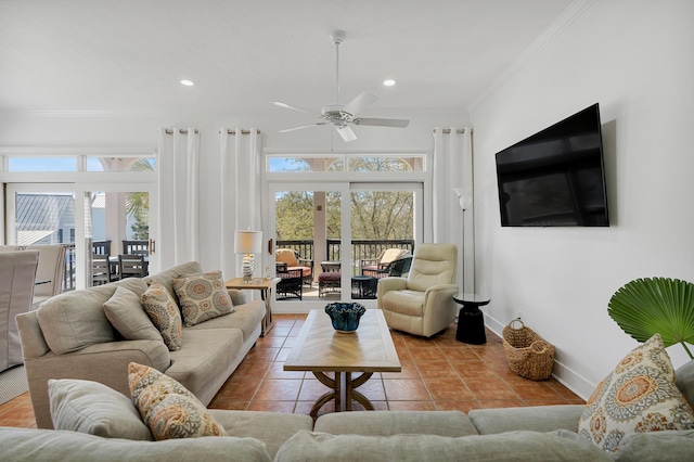 tiled living area with ornamental molding, recessed lighting, a ceiling fan, and baseboards