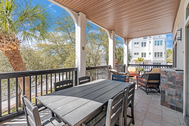 view of patio featuring outdoor dining area