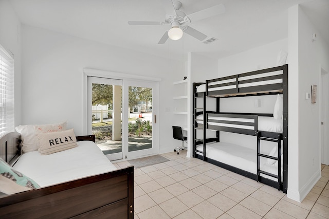 bedroom with light tile patterned floors, access to outside, visible vents, and baseboards