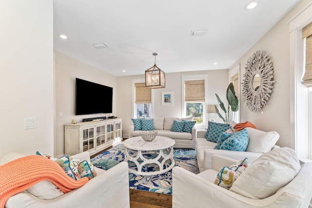 living room with visible vents and recessed lighting