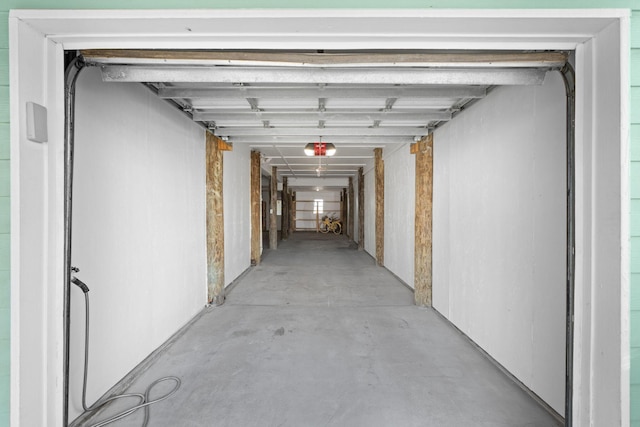 corridor with concrete flooring