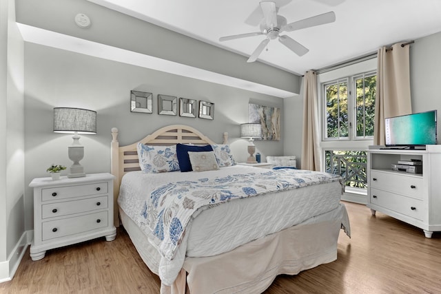 bedroom with wood finished floors and a ceiling fan