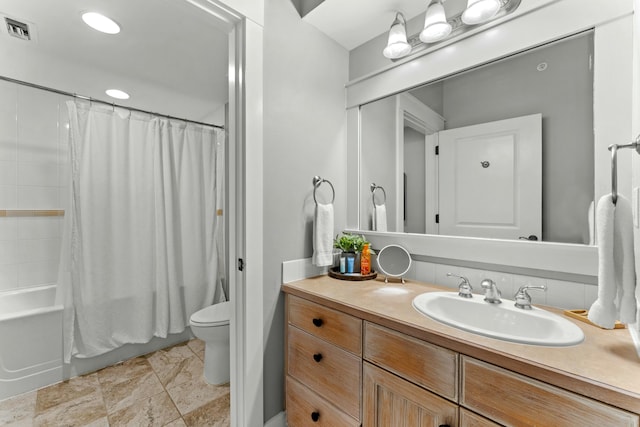 full bathroom featuring shower / bath combination with curtain, visible vents, vanity, and toilet