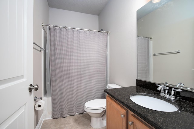 bathroom featuring shower / bath combo, vanity, toilet, and tile patterned floors