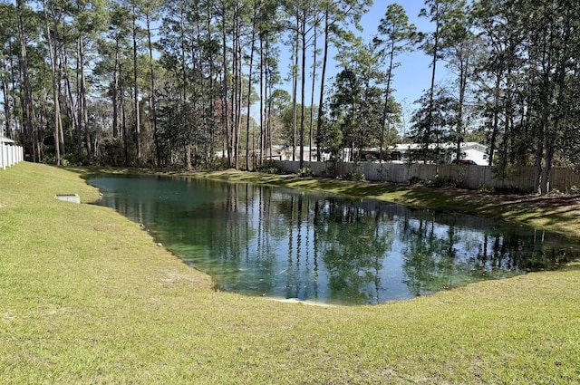 view of water feature with fence