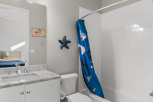 full bathroom featuring connected bathroom, vanity, toilet, and shower / bathtub combination with curtain