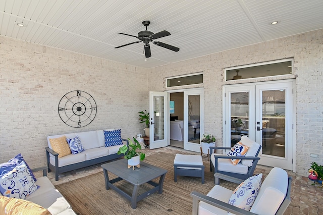 view of patio with an outdoor hangout area and a ceiling fan