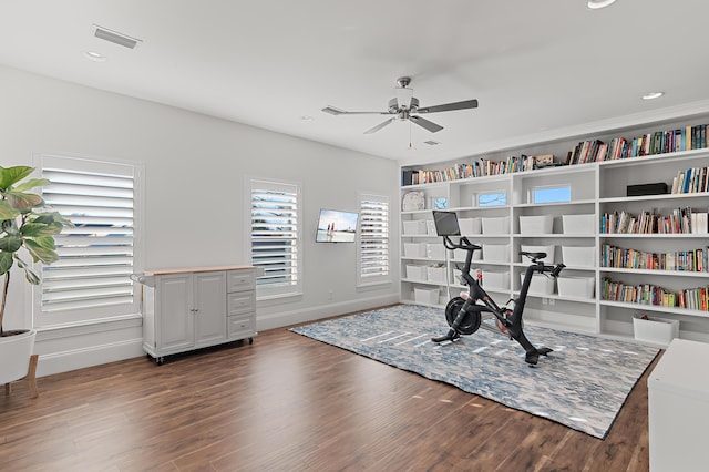 exercise area with visible vents, baseboards, ceiling fan, wood finished floors, and recessed lighting