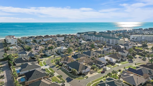 bird's eye view with a residential view and a water view