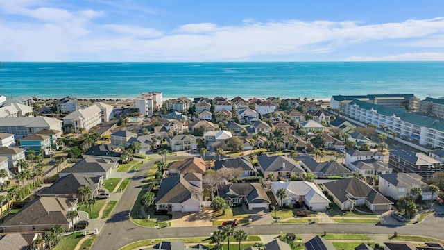 bird's eye view featuring a water view and a residential view