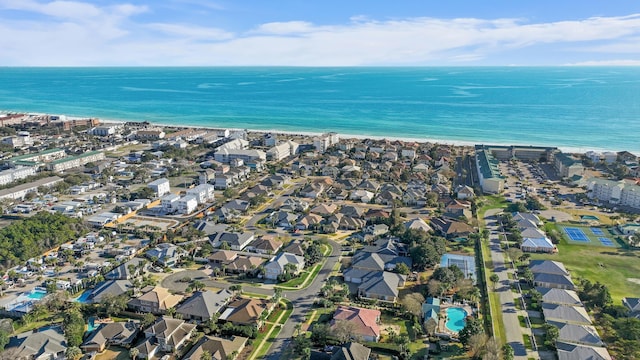 drone / aerial view featuring a water view and a residential view