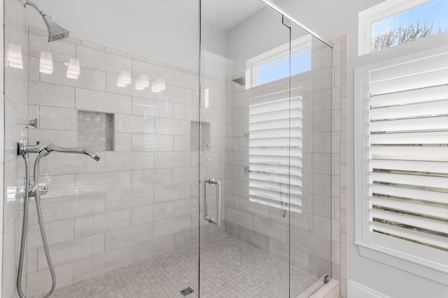 full bathroom with a shower stall