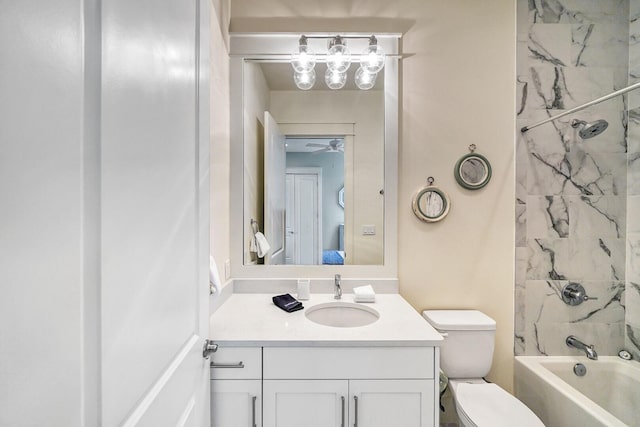 ensuite bathroom featuring toilet, tub / shower combination, vanity, and ensuite bathroom