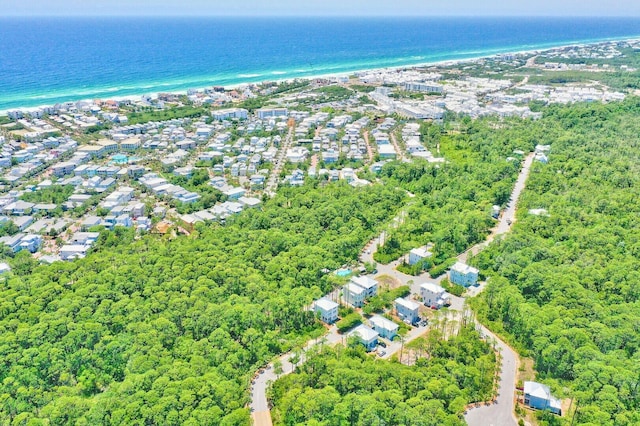 drone / aerial view with a residential view and a water view