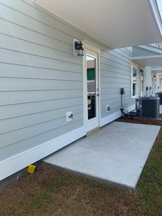 view of patio with central air condition unit