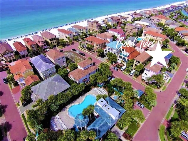 drone / aerial view featuring a water view and a residential view