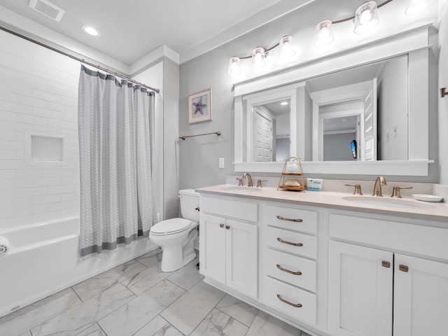 full bath with toilet, marble finish floor, visible vents, and a sink