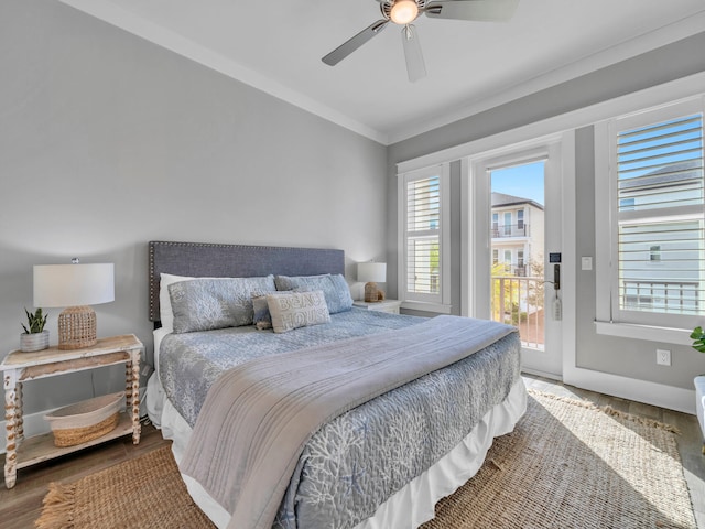 bedroom featuring crown molding, ceiling fan, wood finished floors, and access to exterior