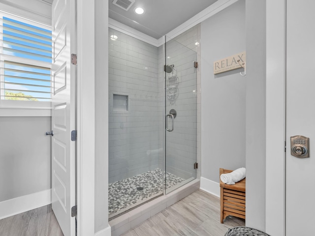 full bathroom featuring a stall shower, visible vents, baseboards, and recessed lighting