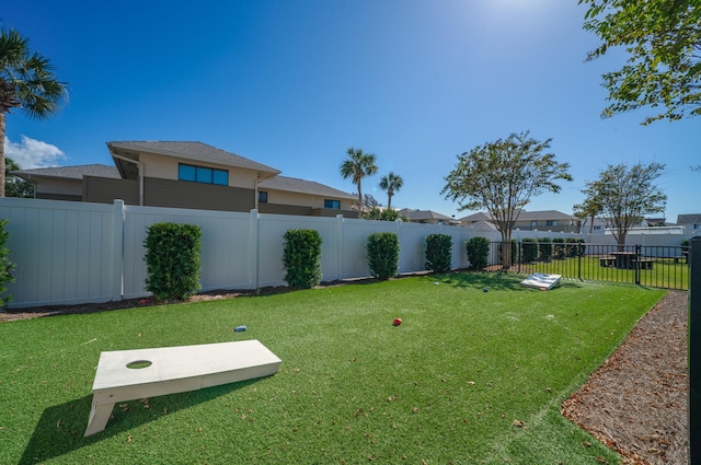 view of yard featuring a fenced backyard