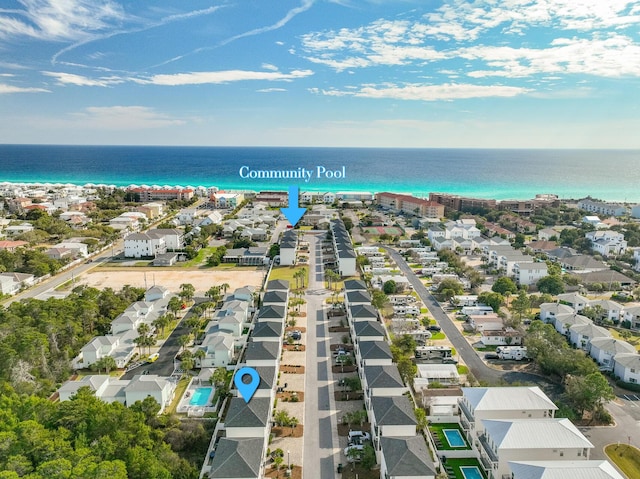 bird's eye view with a water view and a residential view