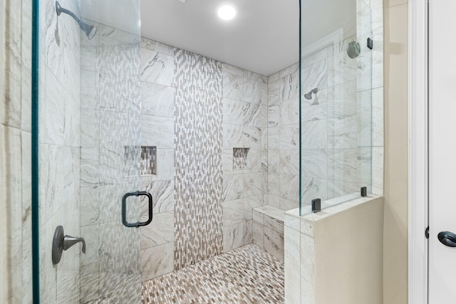 full bathroom with a shower stall