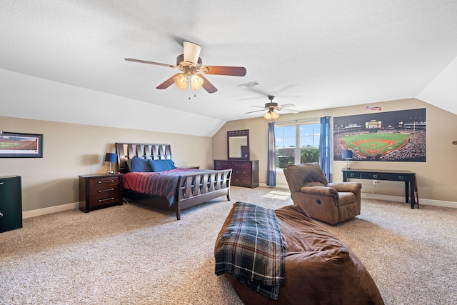 bedroom with carpet floors, baseboards, visible vents, and vaulted ceiling