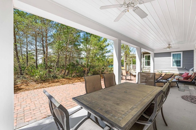 view of patio / terrace with ceiling fan and outdoor dining area