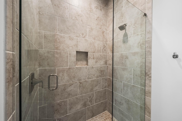 full bathroom with a shower stall